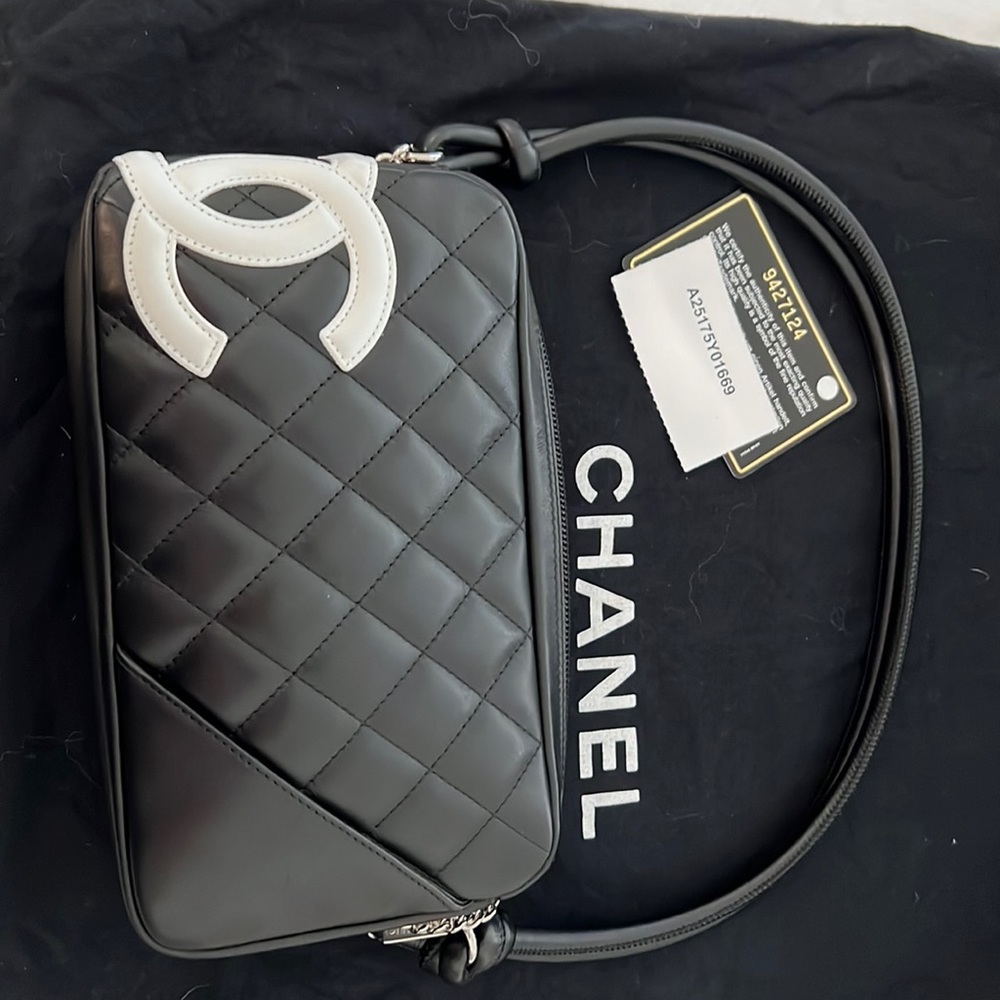 100% Authentic Chanel Calfskin Quilted Cambon Pochette Black/White in orig’l box